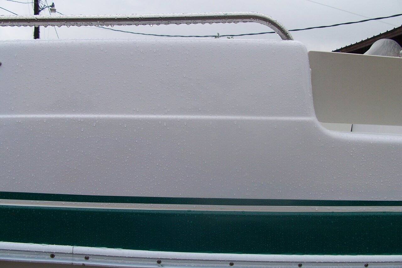 Cockpit side with a green stripe after the crack was repaired